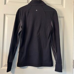 Lululemon quarter zip pullover. Thumb holes, side zip pocket. No tag.